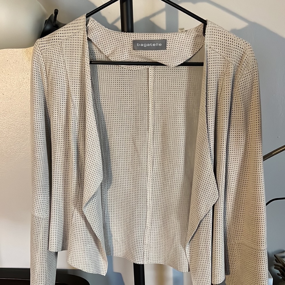 Beige suede bagatelle jacket.